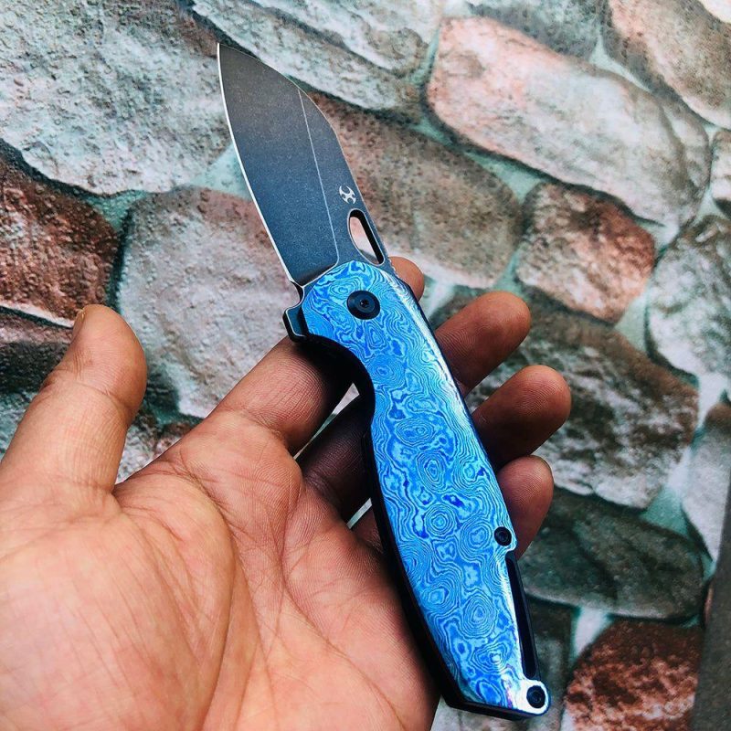 Model 6 K1022A4 Black TiCn Coated M390 Wharncliffe Blade Black Anodized Titanium Timascus Handle Nick Swan Design Black/Timascus | Folding Pocket Knives