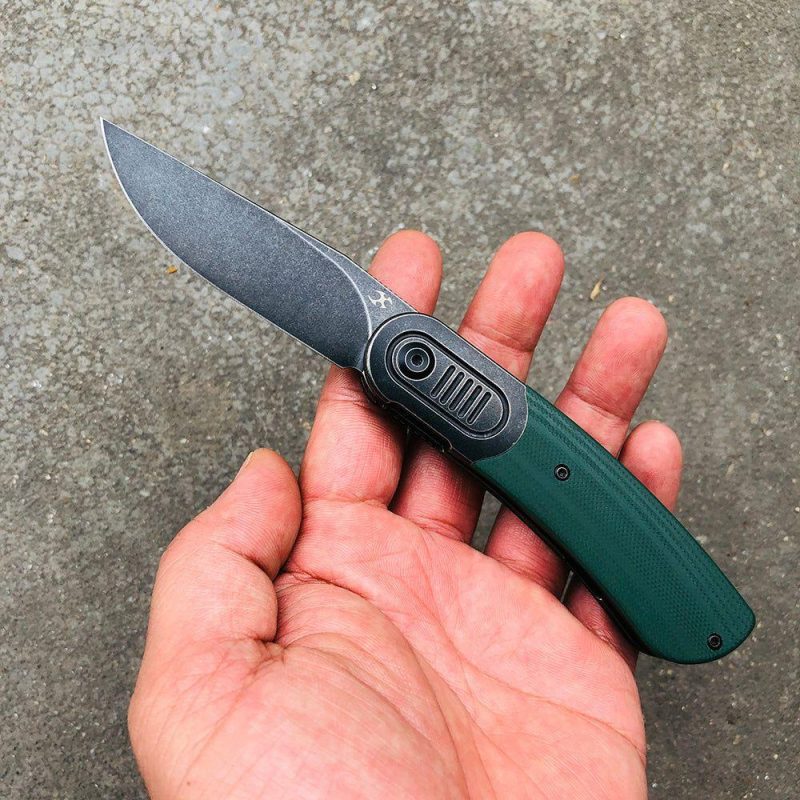 Reverie K2025A6 Under 3” Front Flipper OD Green G10 Handle with Titanium Bolster S35VN Blade Justin Lundquist Design Green | Folding Pocket Knives