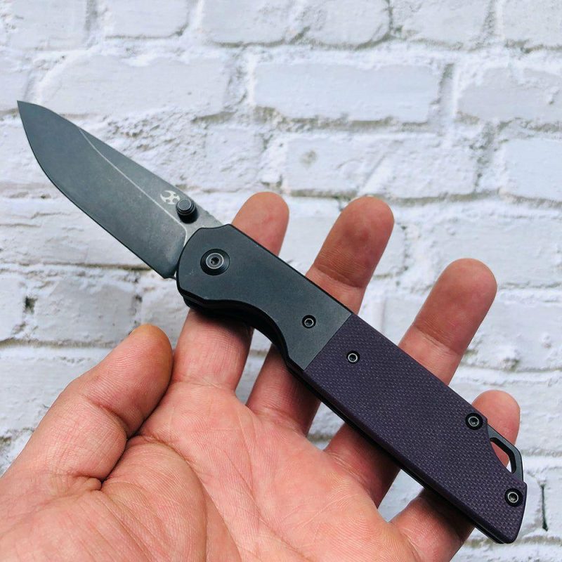 Warrior T1005S6 Black TiCn Coated and Stonewashed Drop Point D2 Blade Black Anodized Aluminum Bolster +Purple G10 Handle with Kim Ning Design | Folding Pocket Knives